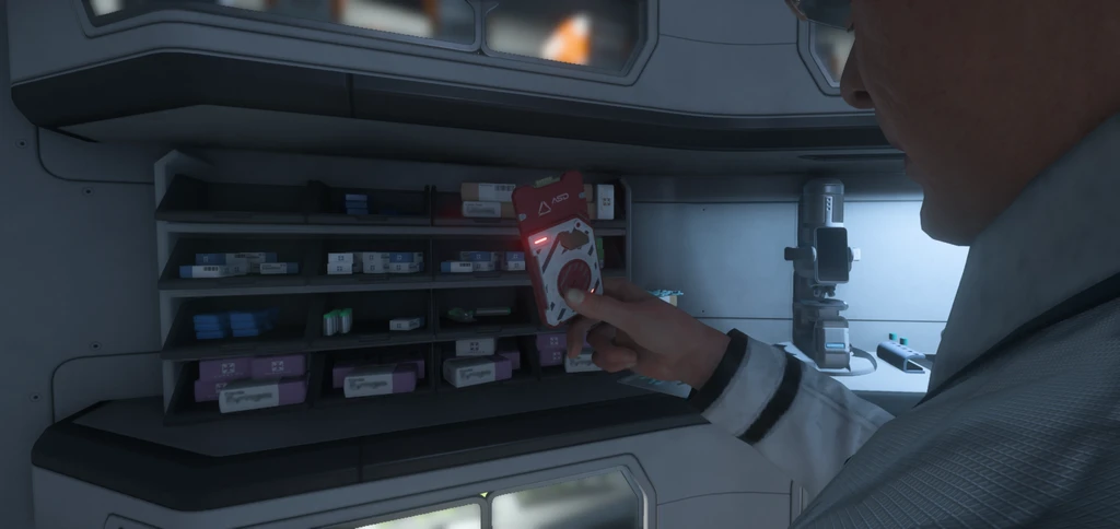 Elderly man in white coat inspecting an ASD Secure Drive inside a medical or scientific laboratory